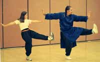 Buddha Zhen with kids teaching Tai Chi Single Whip